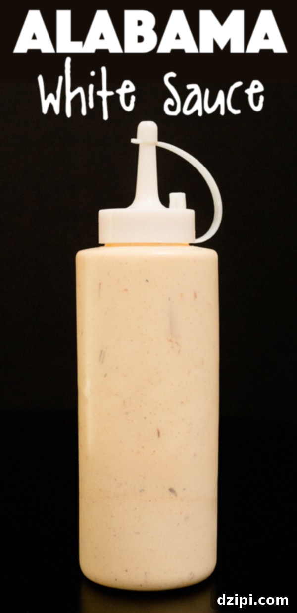 A bottle of creamy white sauce with a label that reads "Alabama white sauce", emphasizing its homemade quality.
