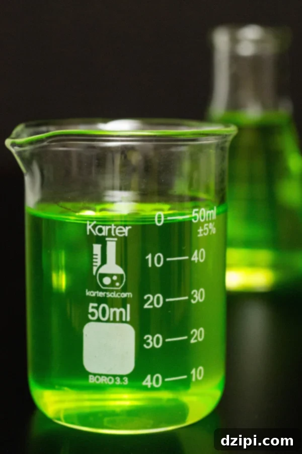Brewing Polyjuice Potion Shots 3 A single beaker shot glass filled with a bright green polyjuice potion shot, perfect for a themed party.