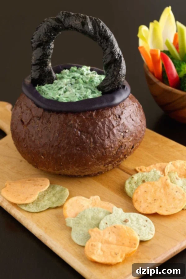 Bewitching Bites 20 Spooky Spinach Dip Cauldron Halloween Party Appetizer with breadsticks