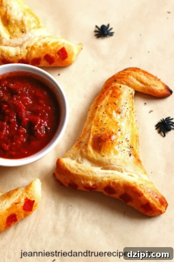 Bewitching Bites 22 Delicious Witch Hat Calzones - Halloween Party Appetizers