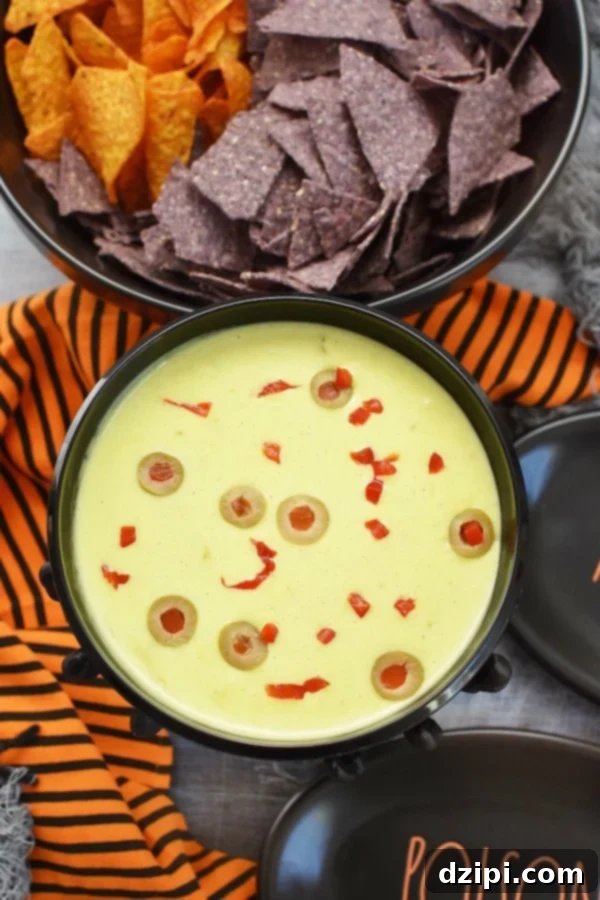 Bewitching Bites 26 Quick Halloween Party Appetizers - Chili Con Queso