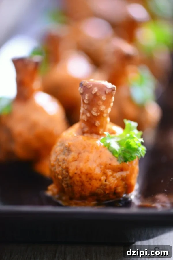 Bewitching Bites 10 Festive Halloween Party Appetizers - Buffalo Meatball Pumpkins