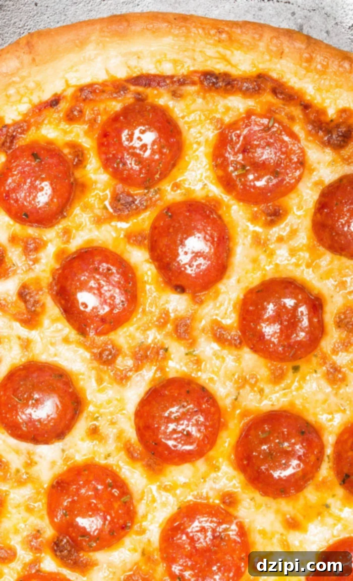 Homemade New York style pizza with pepperonis and cheese.