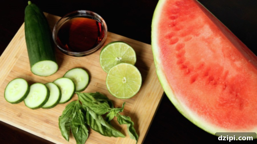 Vibrant Cucumber Watermelon Basil Refresher 3 Fresh ingredients for Cucumber Watermelon Basil Cooler: cubed watermelon, sliced cucumber, lime, and fresh basil leaves.