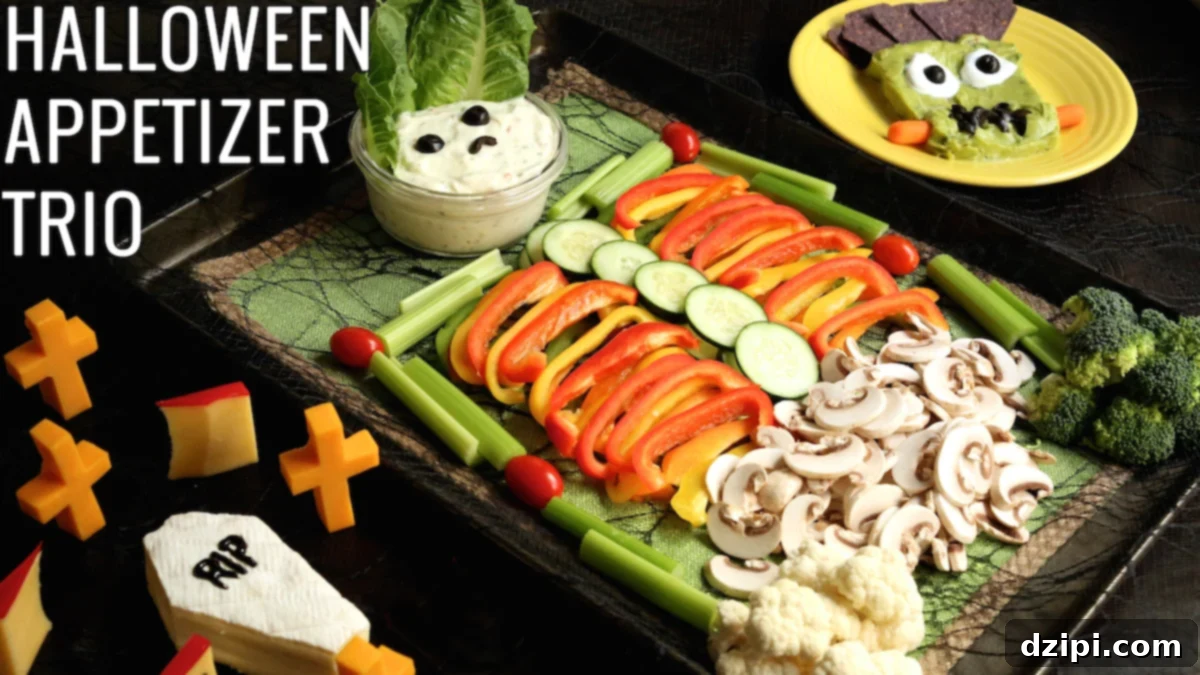 A festive Halloween appetizer platter featuring a skeleton veggie tray, a cheese graveyard, and Frankenstein guacamole, perfect for spooky celebrations.
