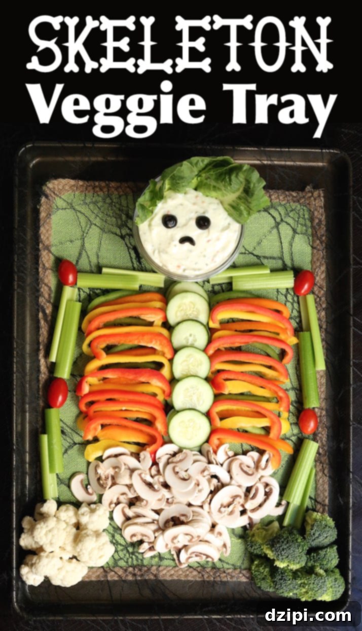 A festive Halloween skeleton veggie tray arranged on a black background, showcasing an array of fresh vegetables for party snacking.