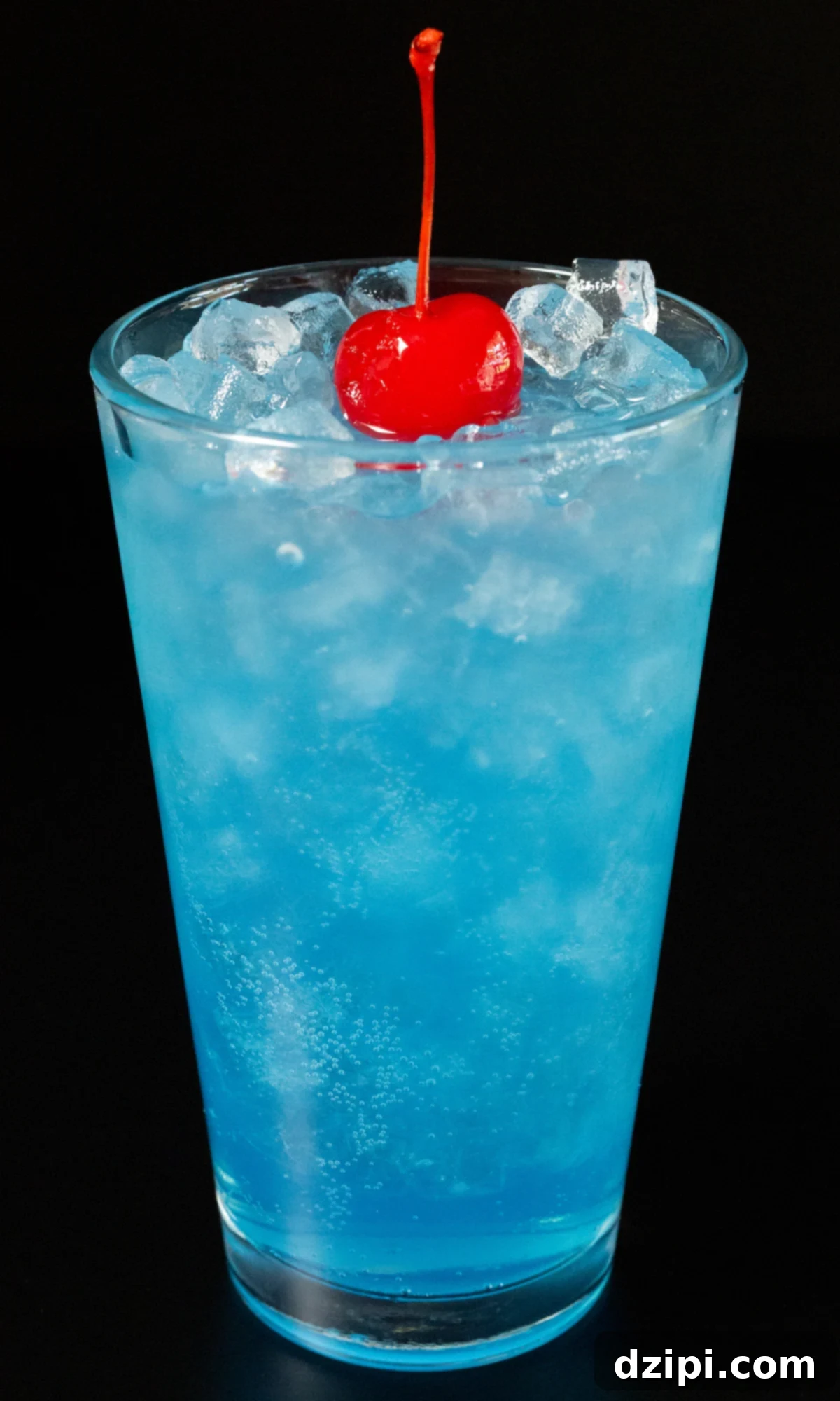 The Endless Blue 2 A vibrant blue Ocean Water drink in a pint glass with pebble ice, garnished for refreshment.