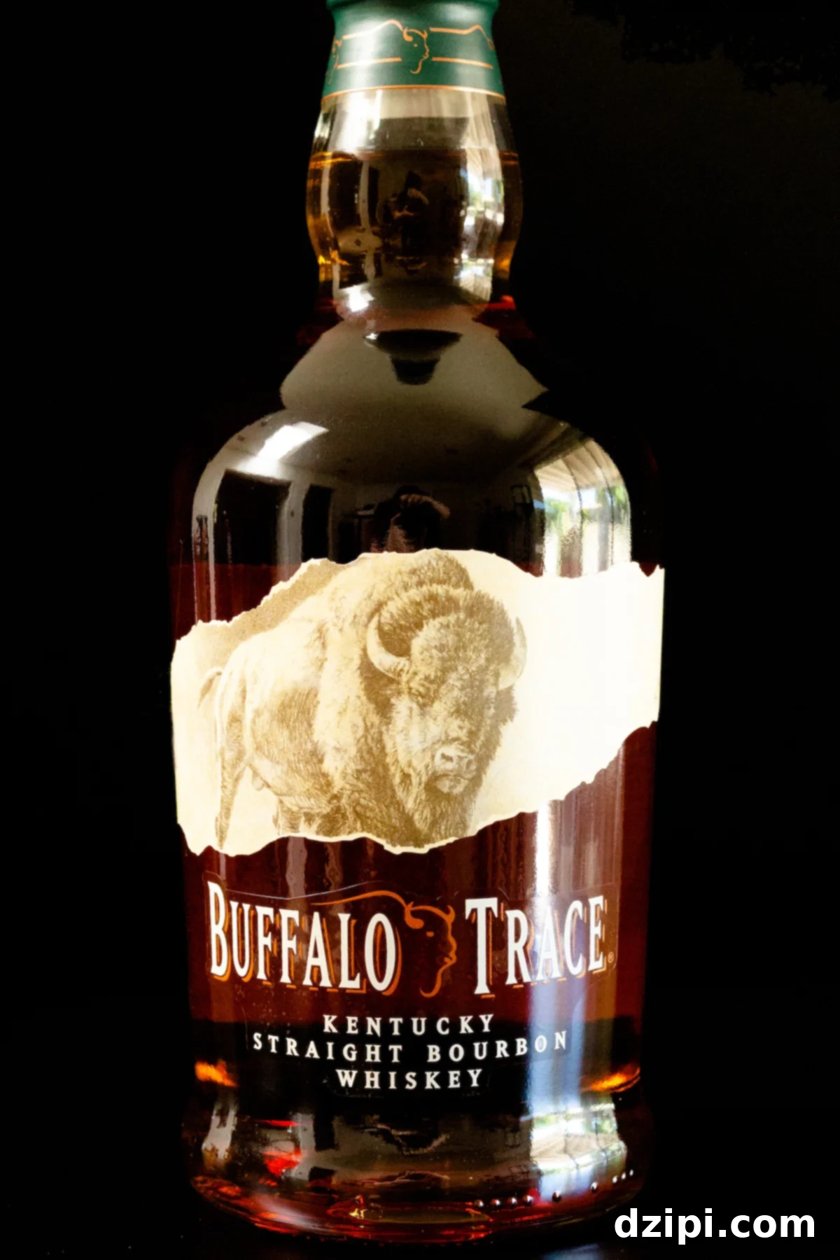 A bottle of Buffalo Trace Bourbon on a black background, a staple for any whiskey enthusiast.