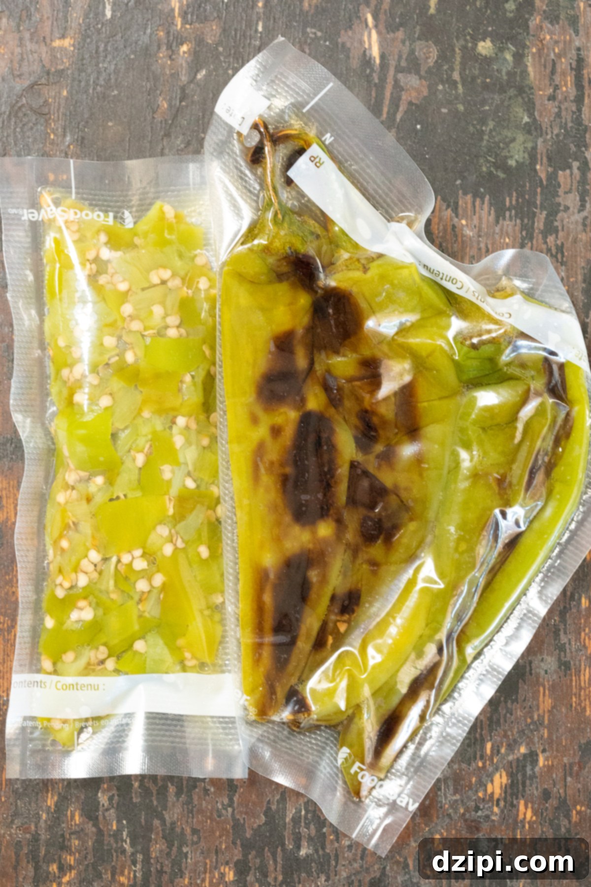 Charred Hatch Chiles 5 Peeled, roasted Hatch Chiles stored in an airtight freezer bag, showcasing preparation for long-term storage.