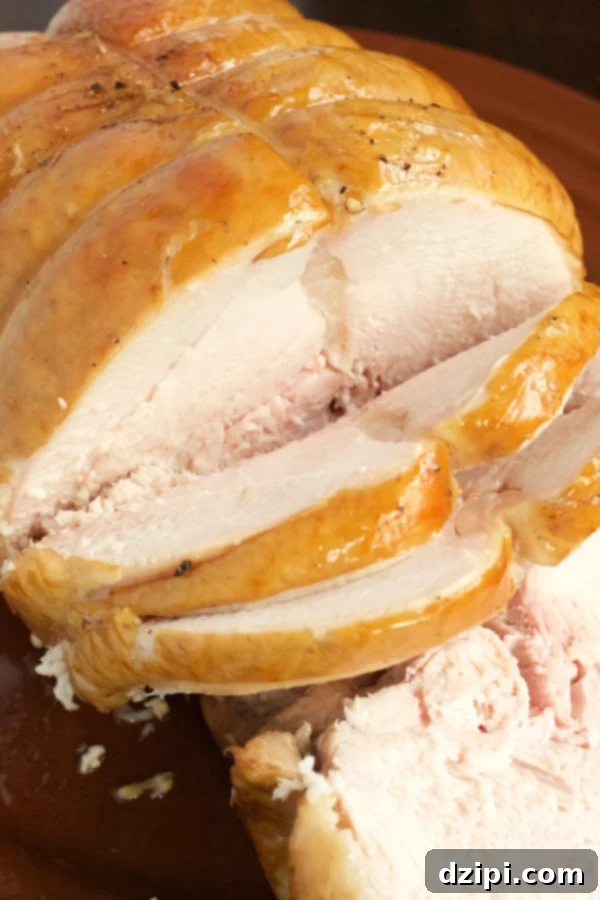 Sweet Tea Infused Southern Turkey Breast 4 Sliced Southern Sweet Tea Brined Turkey Breast, showcasing its juicy texture and perfect golden-brown crust.