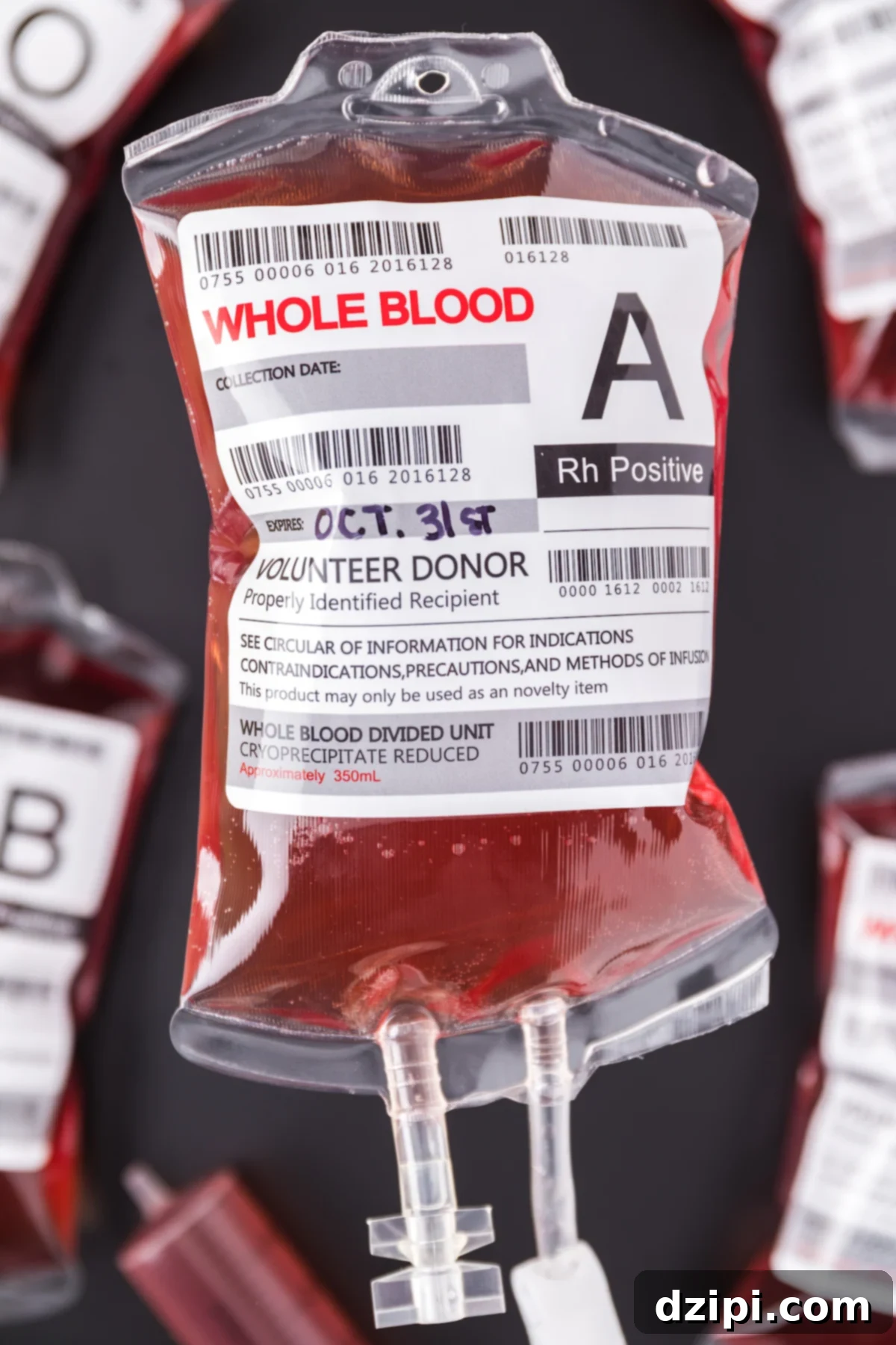 A fake plastic IV bag has been filled with a red punch that resembles blood. 