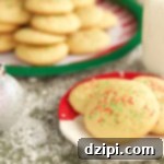 Festive Holiday Sugar Cookies 4 Close-up of perfectly baked Classic Christmas Sugar Cookies with a hint of golden crispness