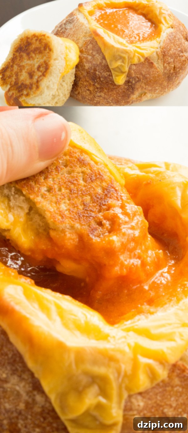 Delicious Goat Cheese Tomato Soup in a Grilled Cheese Bread Bowl, ready to be eaten