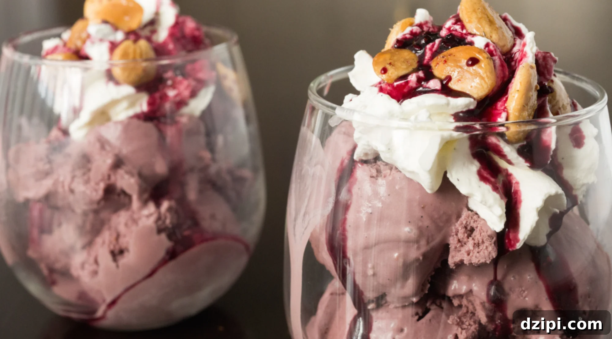 A decadent Red Wine Ice Cream Sundae recipe featuring creamy vanilla bean whipped cream, aromatic spiced wine syrup, and crunchy lavender almonds, presented in an elegant wine glass.