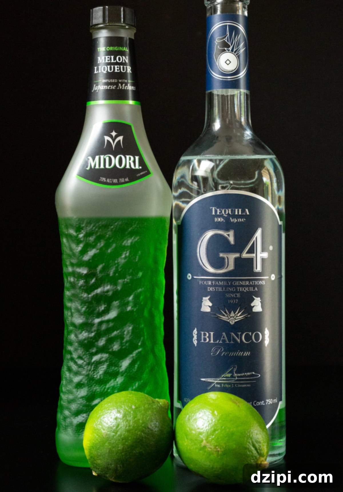 Emerald Melon Margarita 3 A high-quality bottle of Midori liqueur and a premium bottle of G4 tequila are prominently displayed alongside two fresh, vibrant limes, all set against a sleek black background.