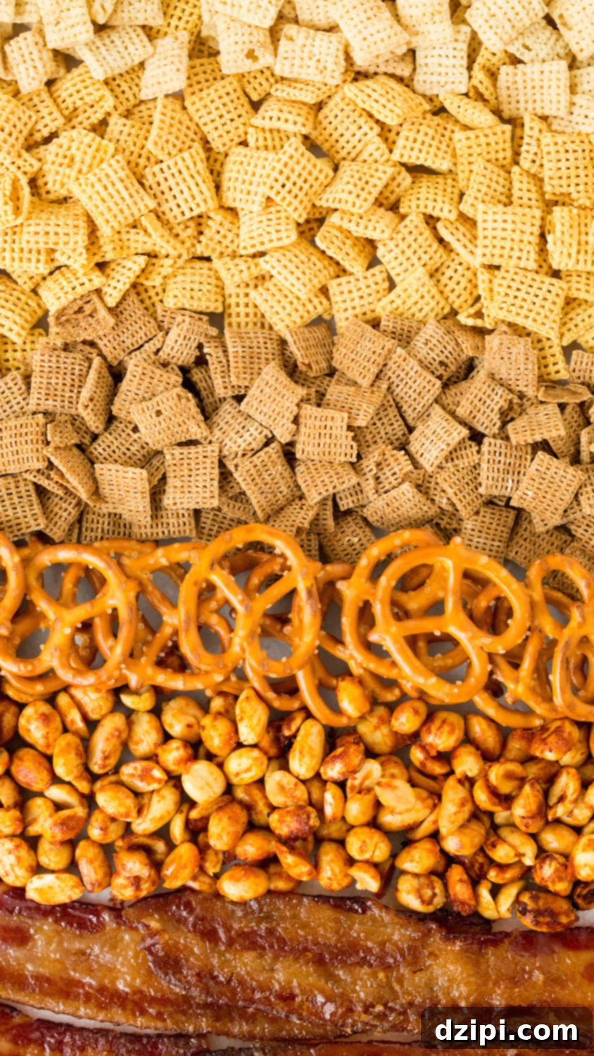 Irresistible Slow Cooker Duck Fat Snack Mix 5 A twist on the classic chex mix snack, this version includes duck fat, sriracha peanuts, and candied bacon.