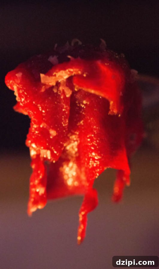 Exquisite reindeer carpaccio, thinly sliced raw meat with truffle oil and Parmesan, at Hotel Ranga.