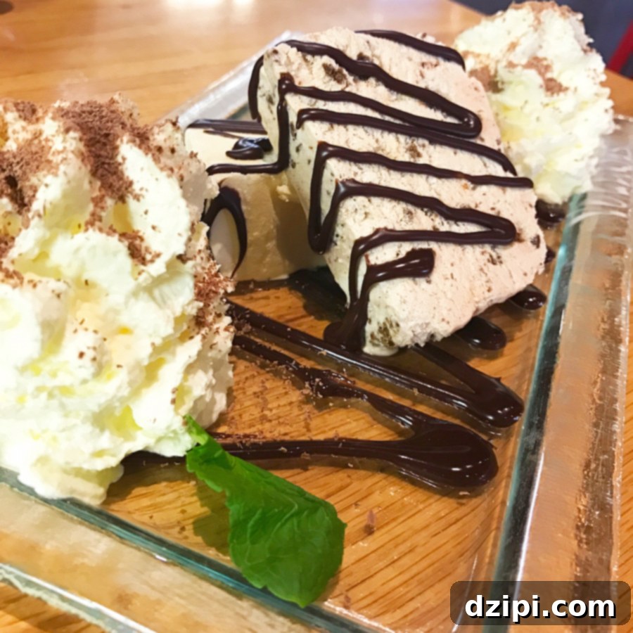 Freshly made ice cream, two flavors with generous whipped cream, from Vogafjos Cow Cafe.