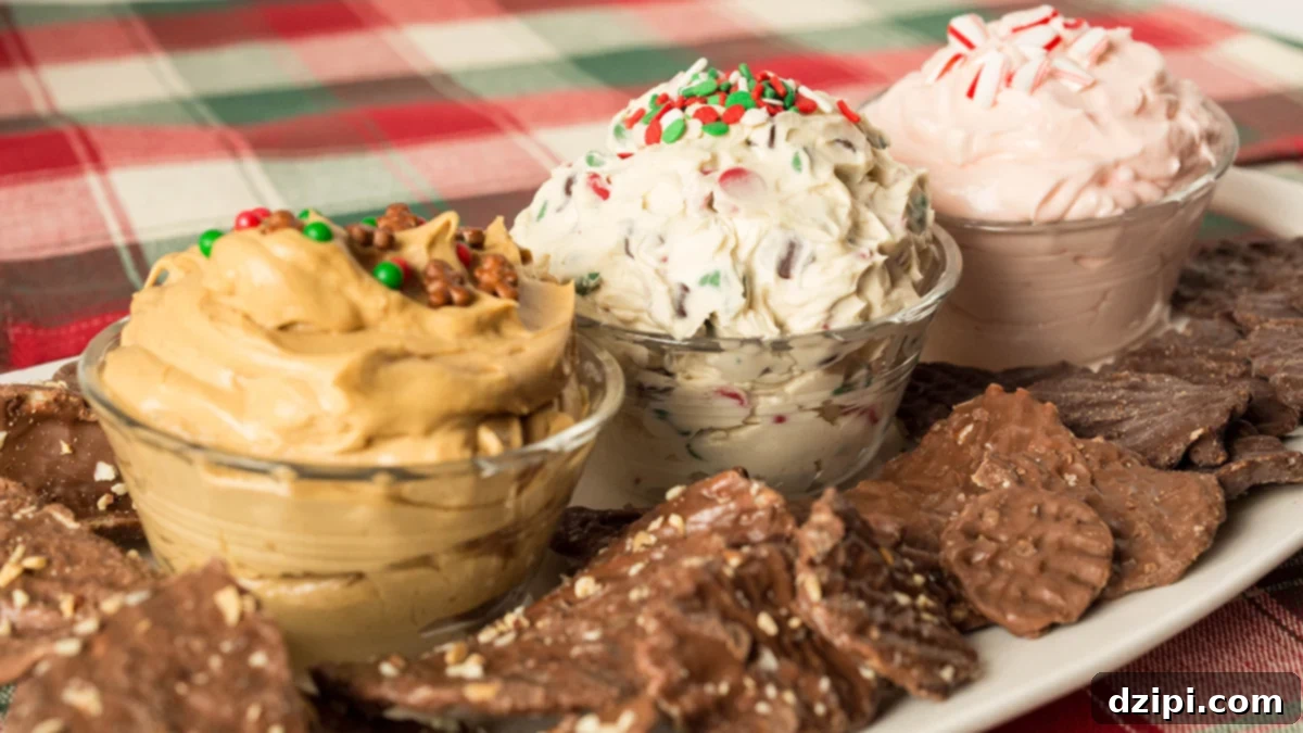 A trio of festive Christmas dessert dips: Christmas Cookie Dough Dip, Gingerbread Dip, and Peppermint Fluff, served alongside various Chocolate Wavy Lay's Potato Chips for the ultimate sweet and salty holiday platter.