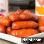 Spicy Apple Cranberry Glazed Little Smokies 5 Make apple cranberry little smokies in the crock pot for a Christmas appetizer.