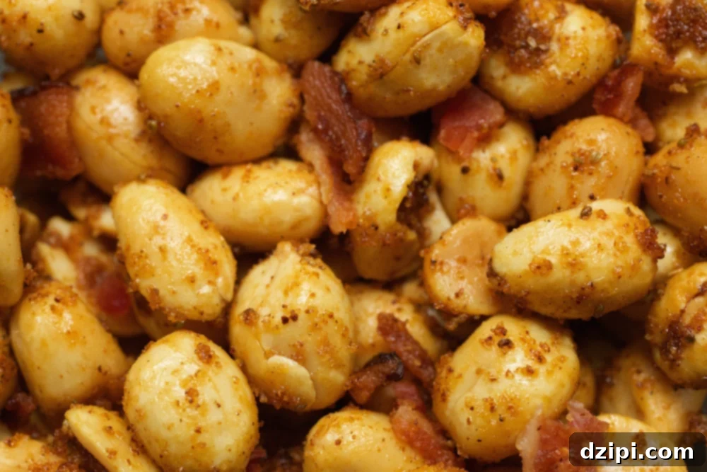 Extreme close up of Old Bay & Bacon seasoned peanuts.