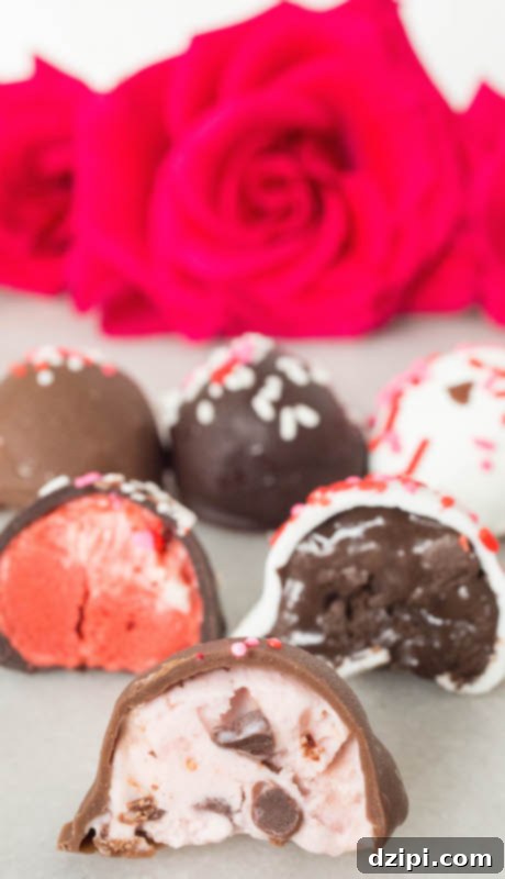 Three exquisite Gelato Truffles, halved to display distinct flavors: raspberry dark chocolate, strawberry chocolate chip, and red velvet cream cheese swirl, each coated in different chocolate shells.