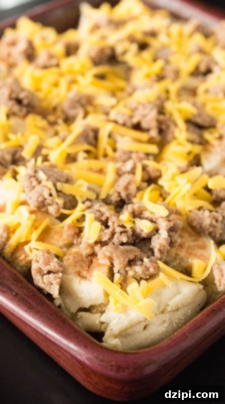 Sausage Egg McMuffin Breakfast Casserole in the baking dish before being cooked.