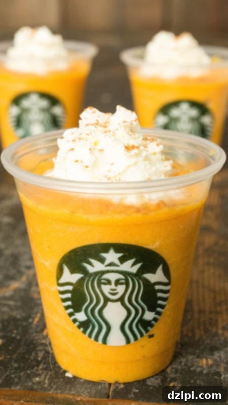 A close-up of a perfectly frothed pumpkin spice latte for dogs, served in a tiny, stylish cup.