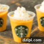 Pumpkin Spice Latte for Dogs Recipe Main Image - a small cup with latte.