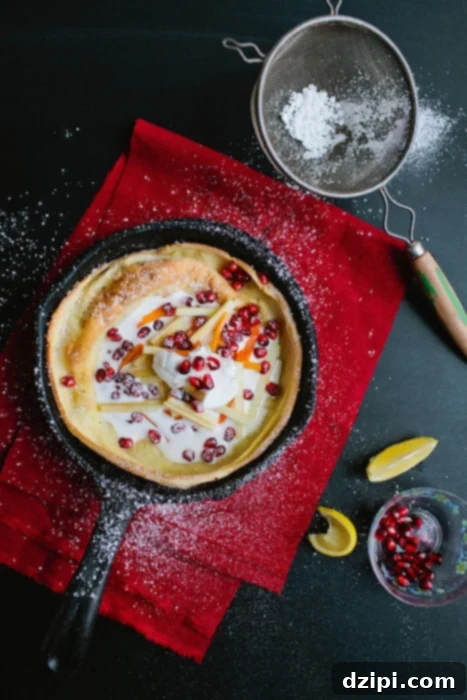 Impressive Christmas Holiday Dutch Baby with Pomegranate and Persimmon