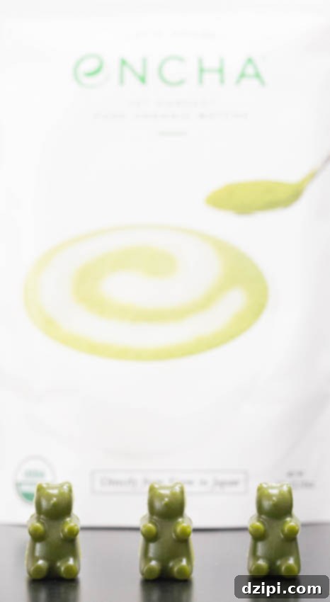Three bright green matcha gummy bears artfully arranged in front of a distinctive Encha organic matcha powder bag, emphasizing the brand's quality.