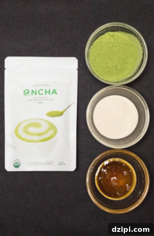 Essential ingredients for matcha gummy bears – water, honey, gelatin, and Encha matcha powder – neatly arranged on a contrasting dark background.