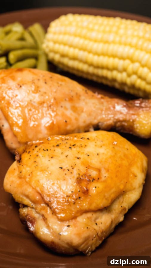 Perfectly cooked, browned chicken pieces from the marinade, served on a dinner plate with a vibrant garnish.