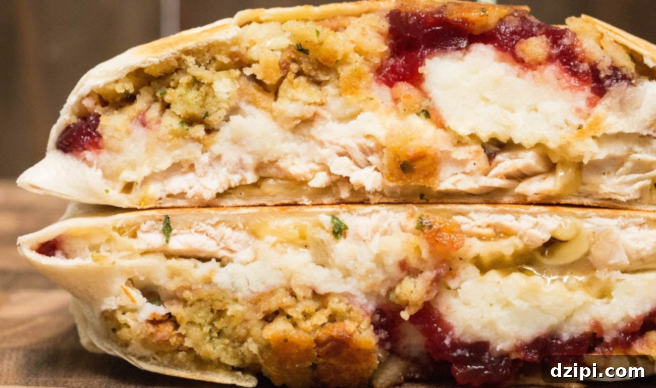 Next-Level Thanksgiving Leftover Crunchwrap 2 A delicious Thanksgiving Leftovers Crunchwrap Supreme, cut in half to reveal layers of turkey, mashed potatoes, stuffing, cranberry sauce, and melted cheese, with a crispy tortilla shell.