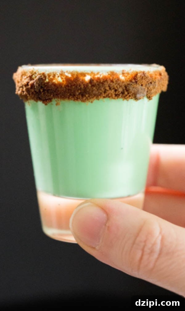 Decadent Thin Mint Shooters 4 Girl Scout Cookie Thin Mint Shots with a close-up of the crushed cookie rim