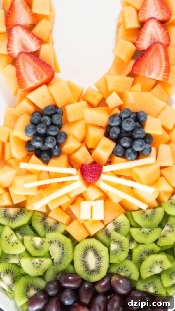 The finished Easter Bunny Fruit Tray with all the ingredients assembled, ready to be enjoyed.