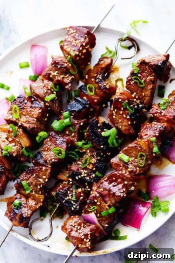 Sun-Kissed Grill Feasts 12 Grilled Asian Garlic Steak Skewers - Tender steak with an aromatic garlic marinade