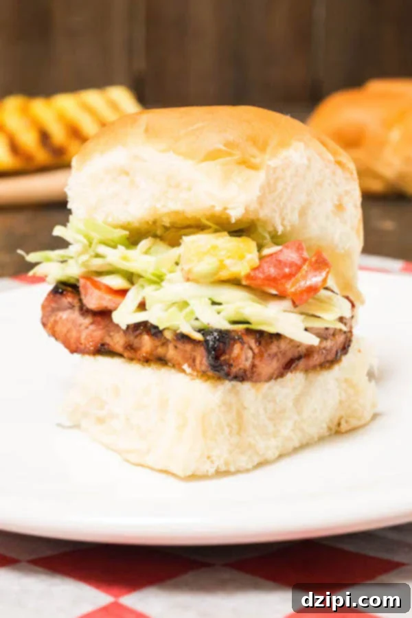 Sun-Kissed Grill Feasts 13 Grilled BBQ Pork Loin Hawaiian Roll Sliders with Spicy Pineapple Slaw - A sweet and spicy slider recipe for grilling