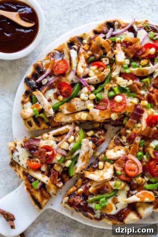 Sun-Kissed Grill Feasts 14 Grilled BBQ Chicken Pizza - Crispy and flavorful pizza made on the grill