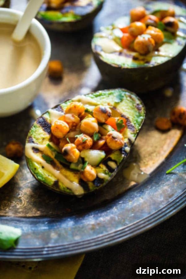 Sun-Kissed Grill Feasts 36 Grilled Avocado Stuffed with Chickpeas & Tahini - A unique and healthy grilled appetizer or side