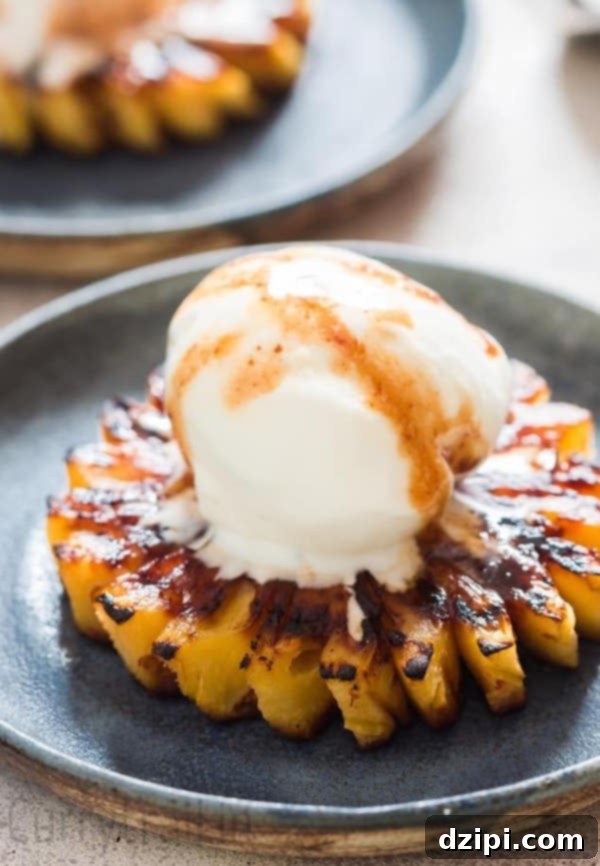 Sun-Kissed Grill Feasts 42 Grilled Pineapple with Brown Sugar Rum Glaze - Sweet and caramelized tropical fruit dessert